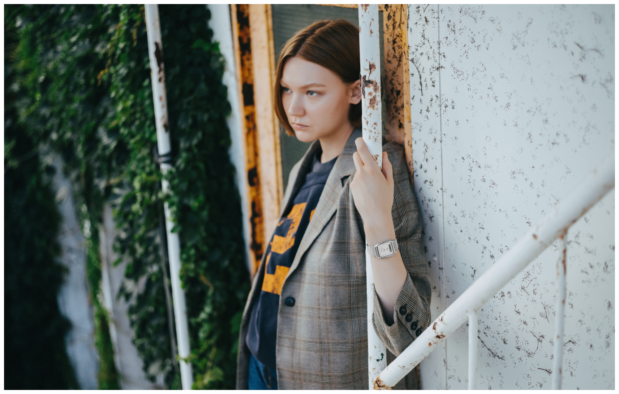 Image of a woman posing while wearing the AQ-230EM-7A.