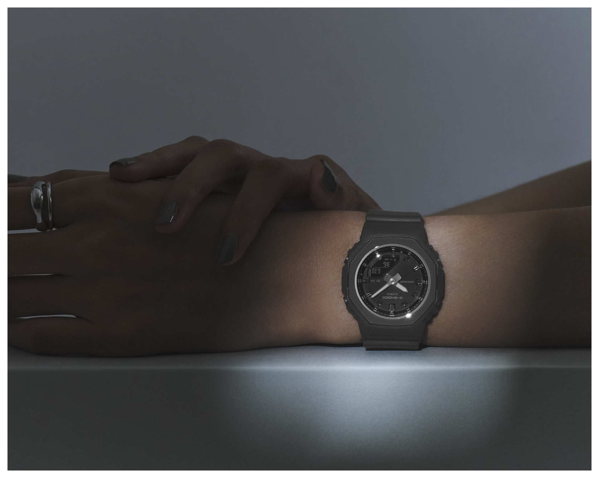 Close-up image of a woman wearing GMA-P2110-1A.